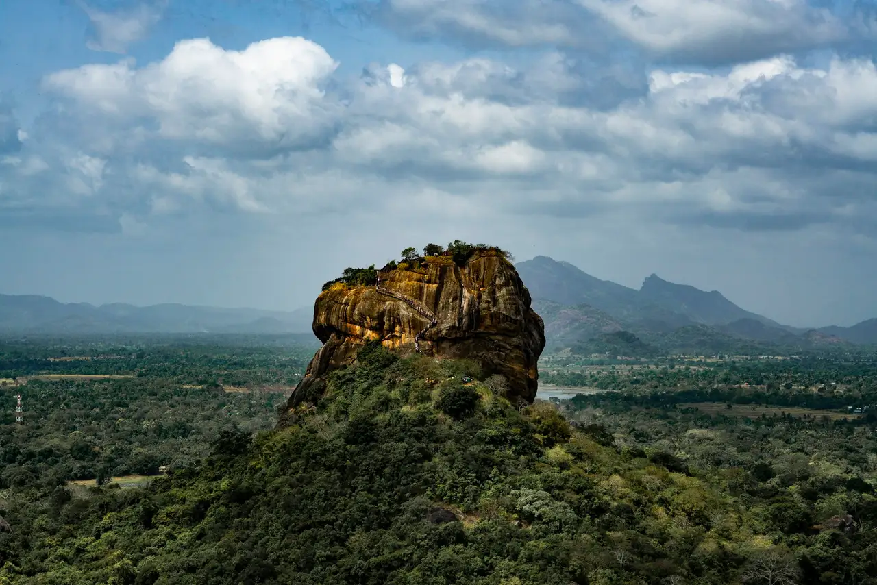 Sigiriya rock rising above the surrounding forest in Sri Lanka